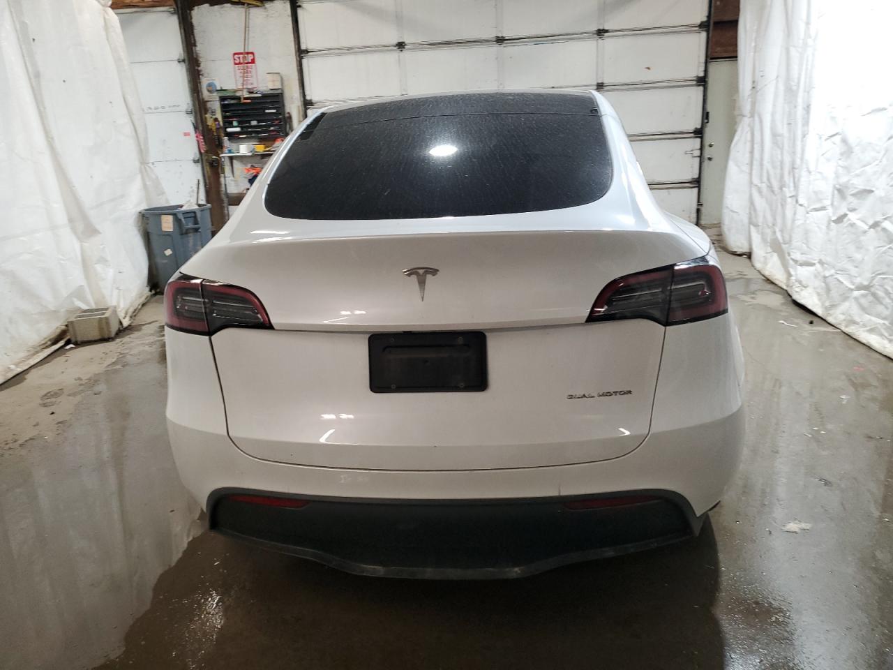 2023 Tesla Model Y VIN: 7SAYGDEE7PA042302 Lot: 78684324