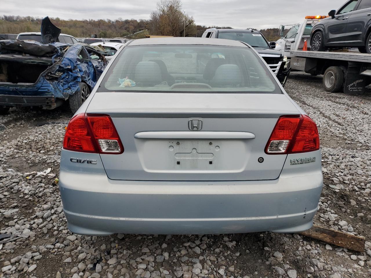 2004 Honda Civic Hybrid VIN: JHMES95644S016986 Lot: 80770894