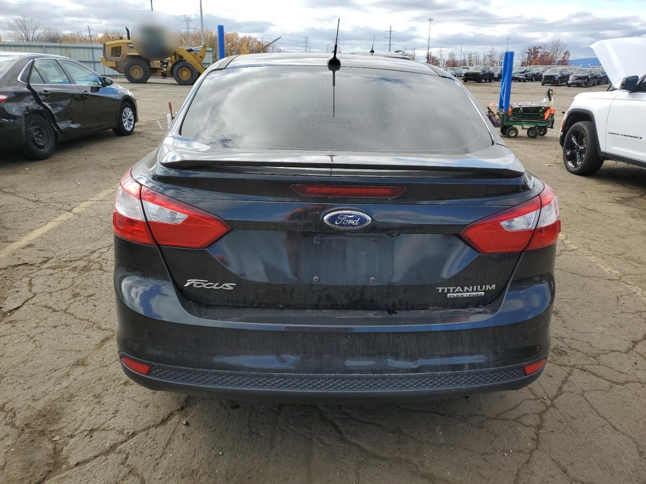 2014 Ford Focus Titanium VIN: 1FADP3J22EL241228 Lot: 78575794