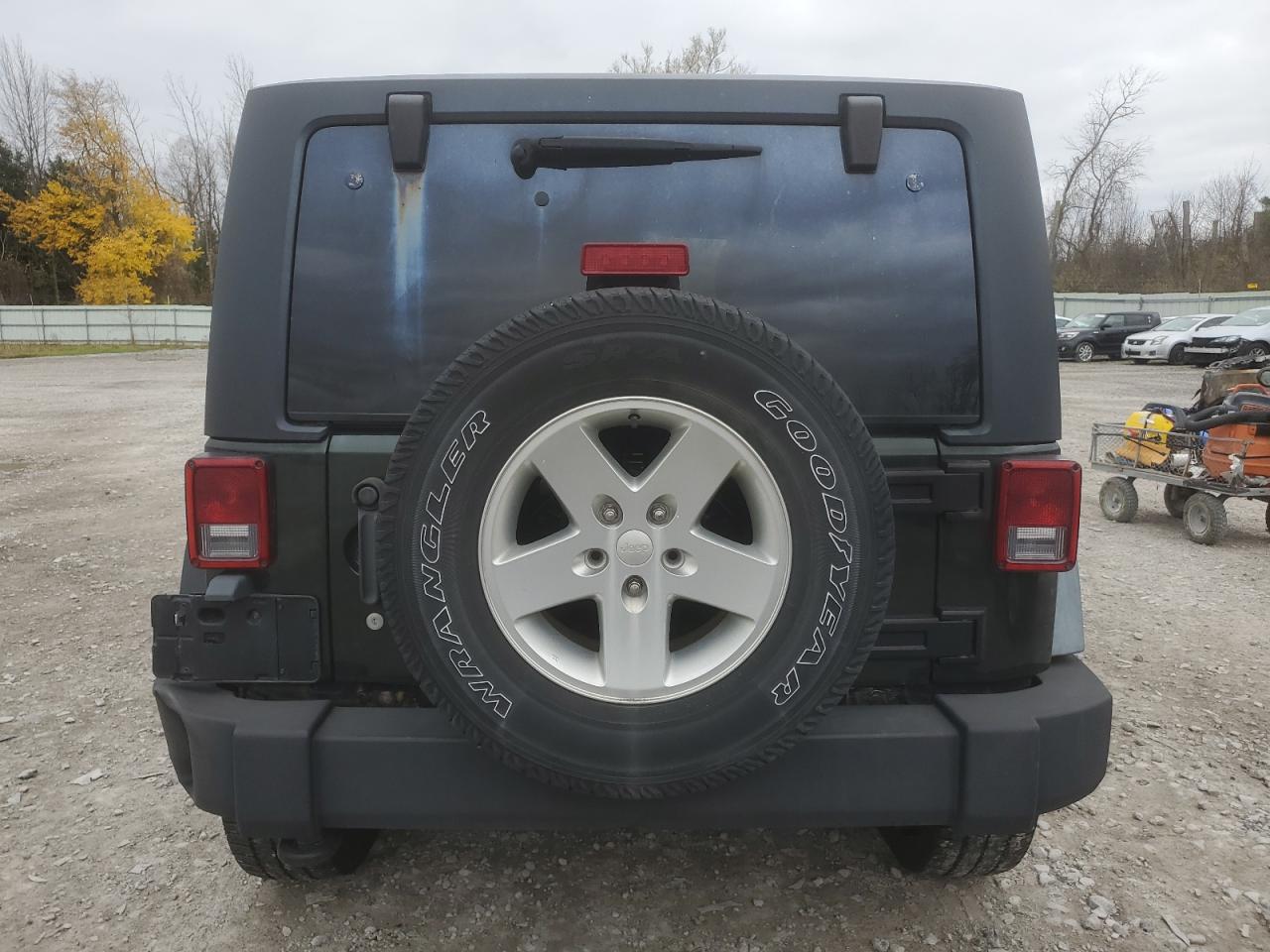 2011 Jeep Wrangler Sport VIN: 1J4GA2D1XBL520020 Lot: 79219654