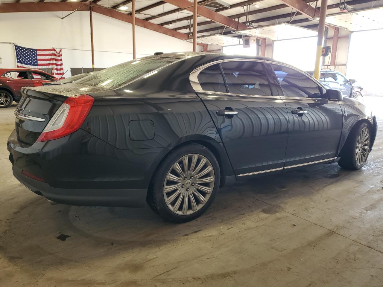 2015 Lincoln Mks VIN: 1LNHL9EK7FG606710 Lot: 79824514