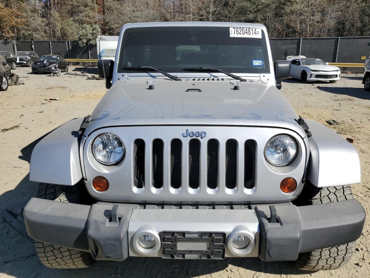 2011 Jeep Wrangler Unlimited Sahara VIN: 1J4BA5H16BL627992 Lot: 76204814