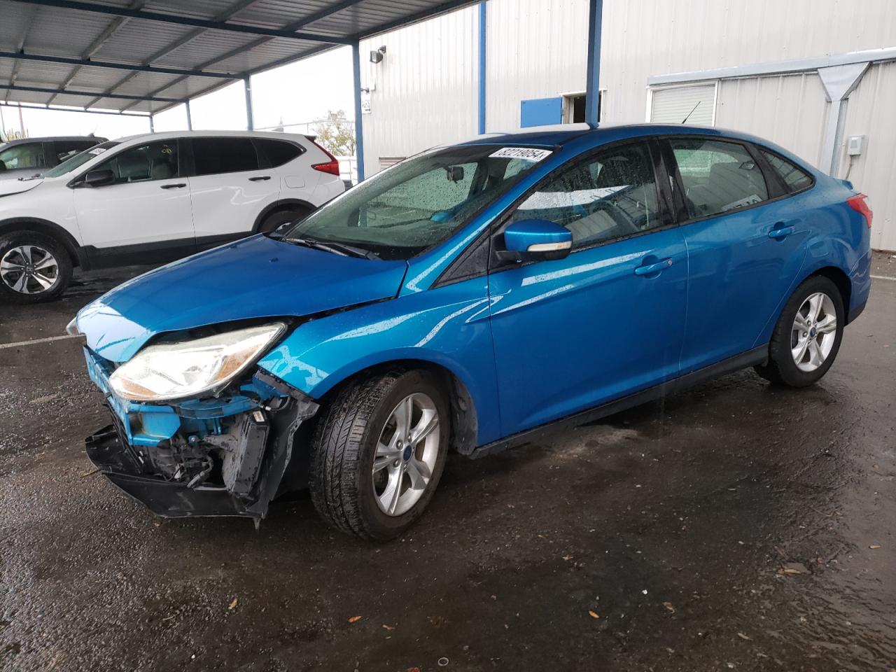 VIN 1FADP3F21DL117054 2013 FORD FOCUS no.1