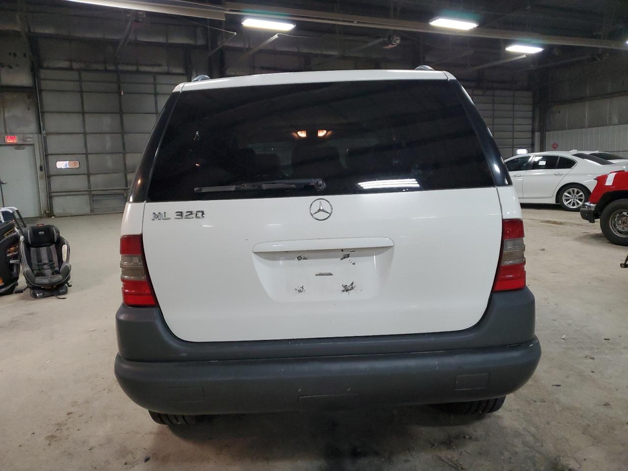 1999 Mercedes-Benz Ml 320 VIN: 4JGAB54E3XA136026 Lot: 80469384