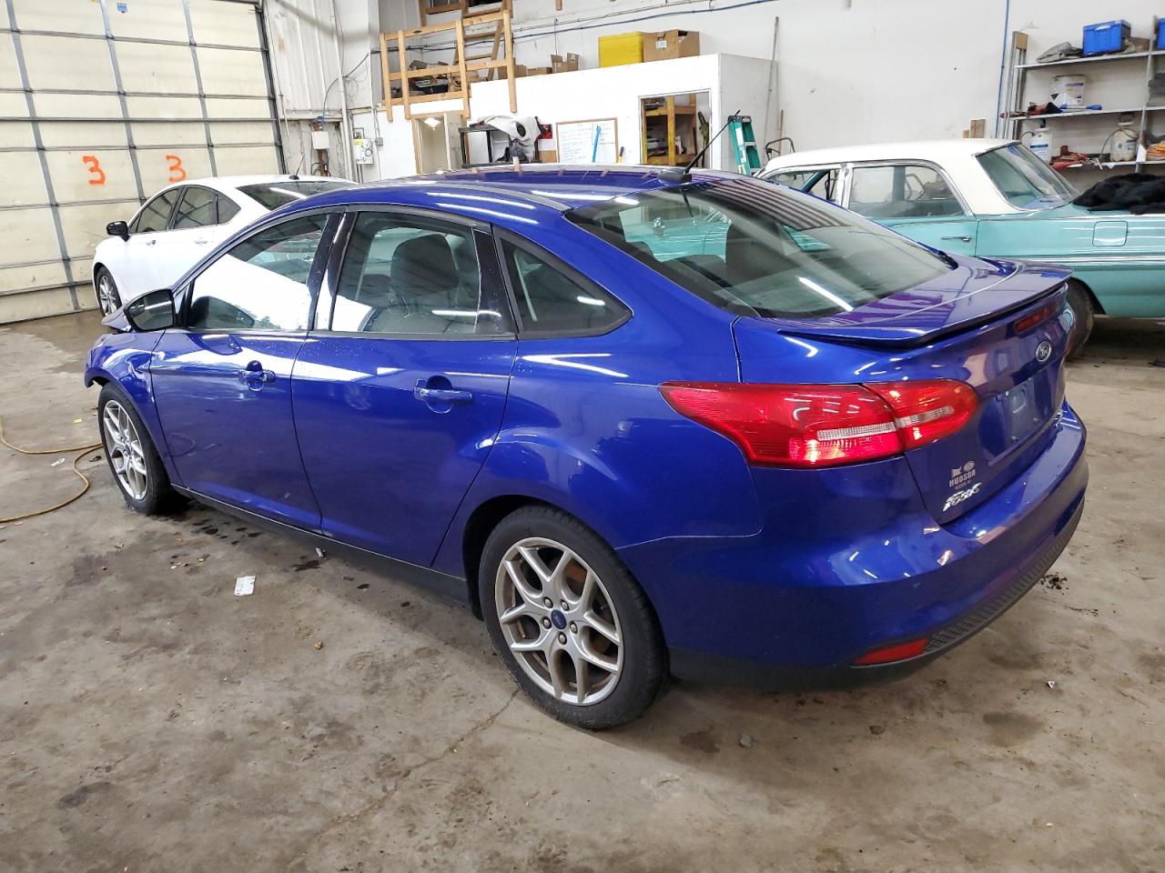 VIN 1FADP3F29FL306327 2015 FORD FOCUS no.2