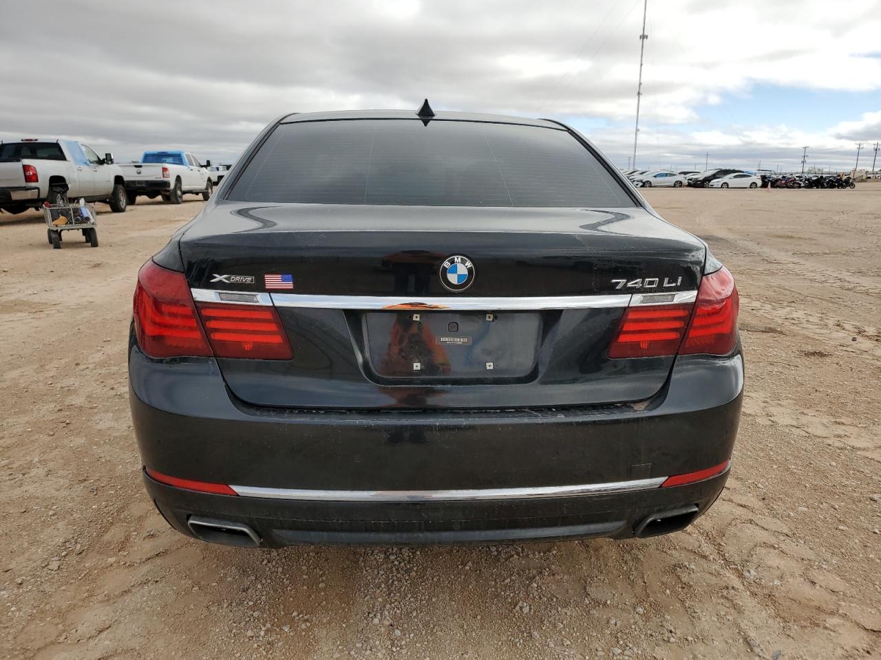 2015 BMW 740 Lxi VIN: WBAYF4C50FGS99289 Lot: 79809474