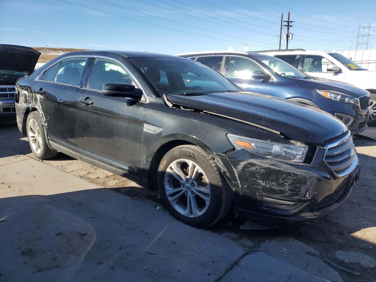 VIN 1FAHP2E82FG149783 2015 FORD TAURUS no.4