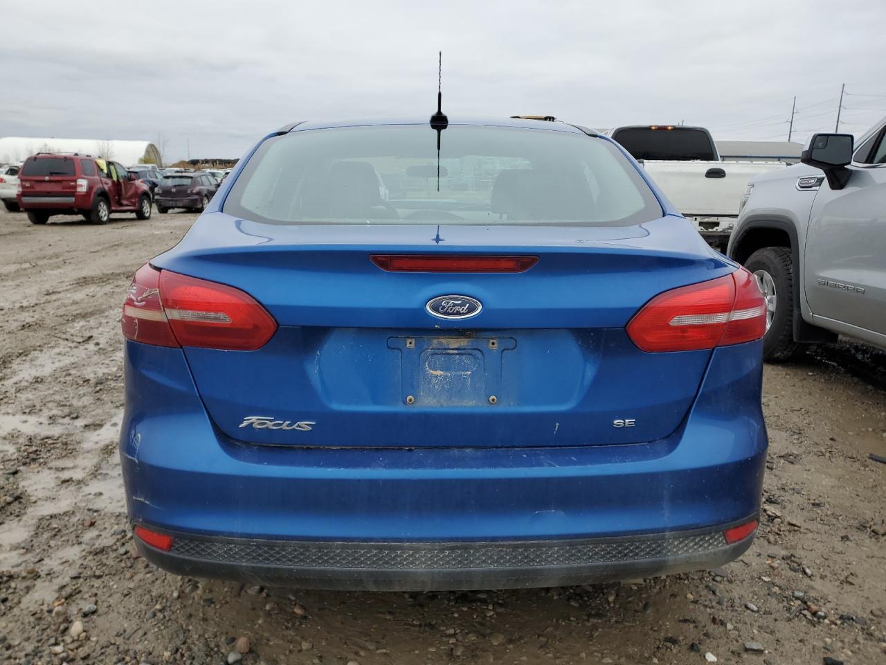 2018 Ford Focus Se VIN: 1FADP3F26JL311011 Lot: 79822234