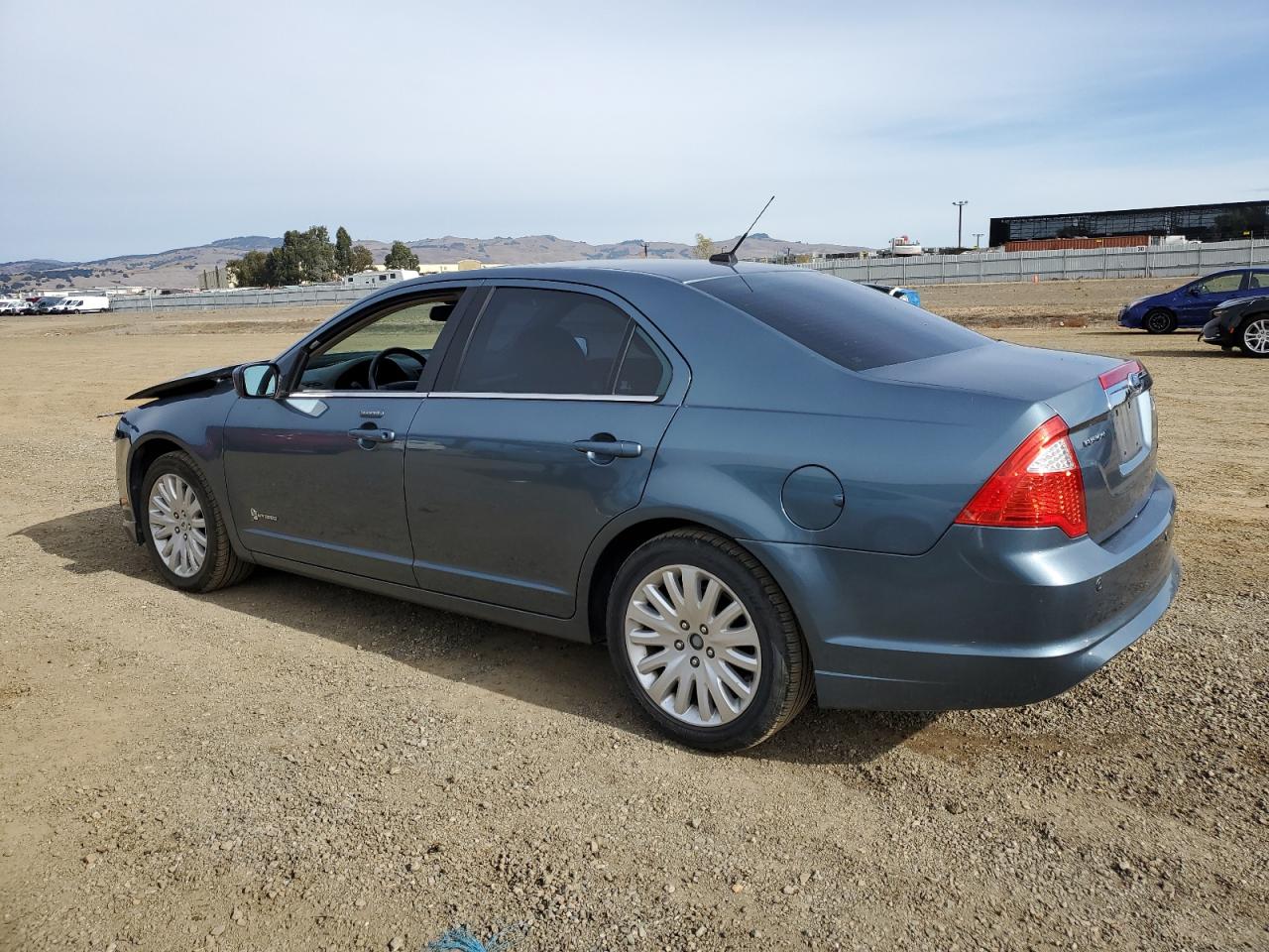 2012 Ford Fusion Hybrid VIN: 3FADP0L38CR447124 Lot: 80590134