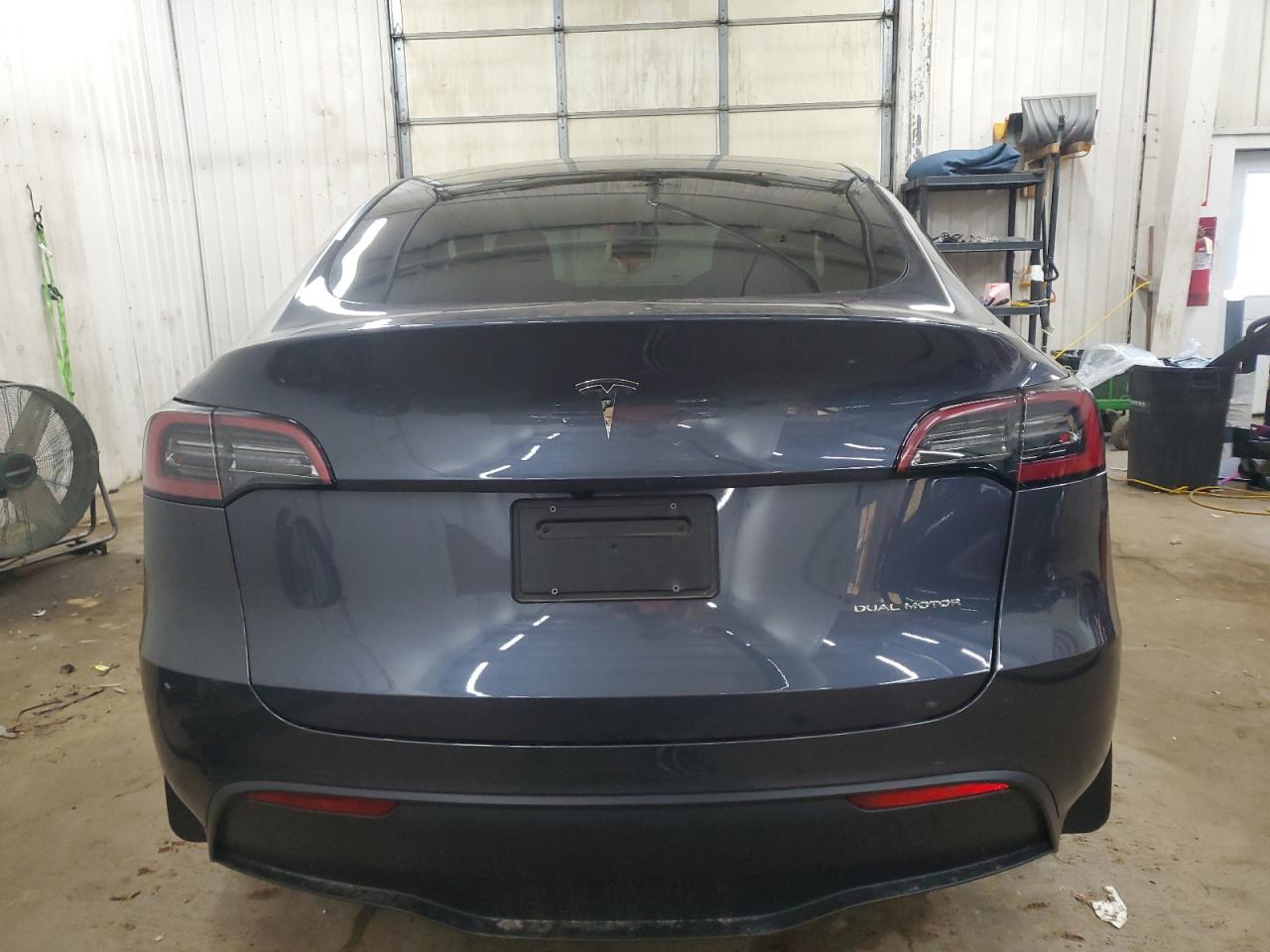 2023 Tesla Model Y VIN: 7SAYGDEE6PF831883 Lot: 77525524