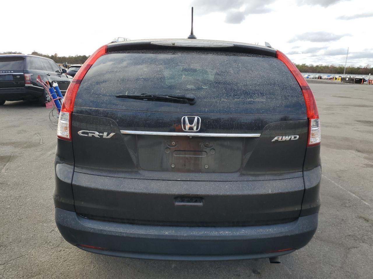 2014 Honda Cr-V Exl VIN: 2HKRM4H76EH677830 Lot: 79250254