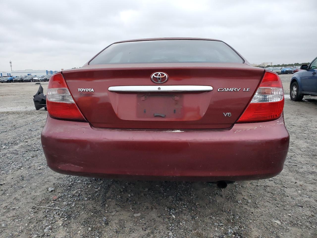 2004 Toyota Camry Le VIN: 4T1BF32K04U077811 Lot: 79829204