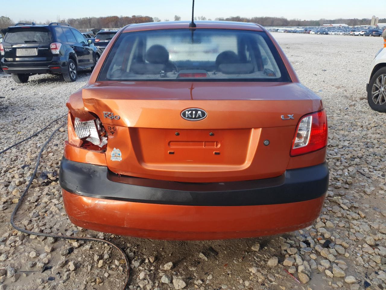 2009 Kia Rio Base VIN: KNADE223996462036 Lot: 79822094