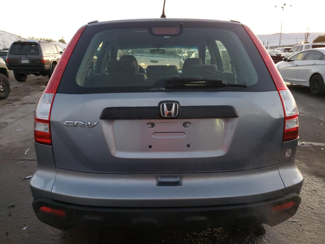 2009 Honda Cr-V Lx VIN: JHLRE48359C011556 Lot: 79107844