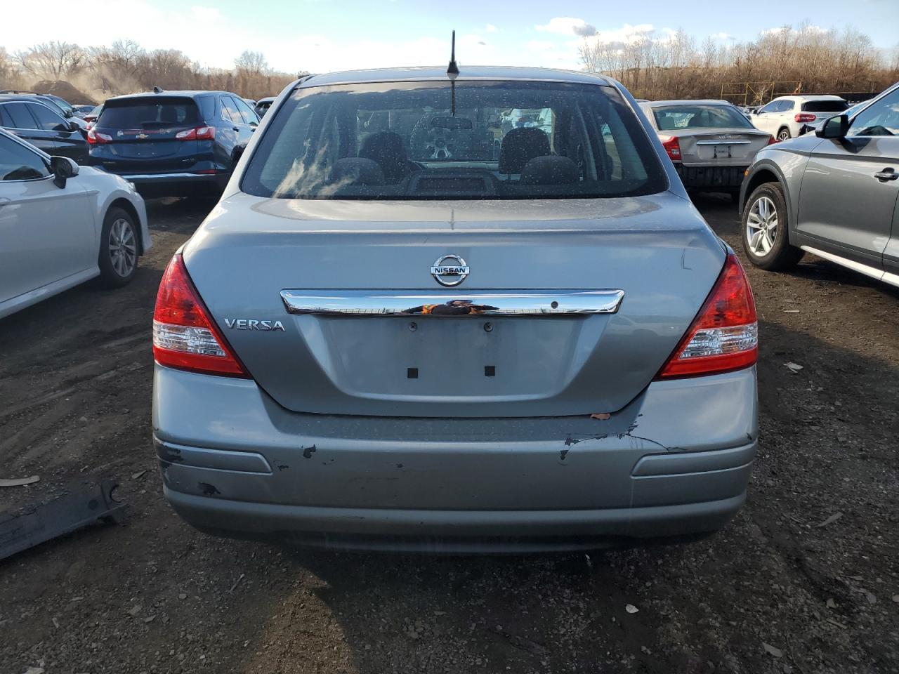 2011 Nissan Versa S VIN: 3N1BC1AP0BL404801 Lot: 79972434