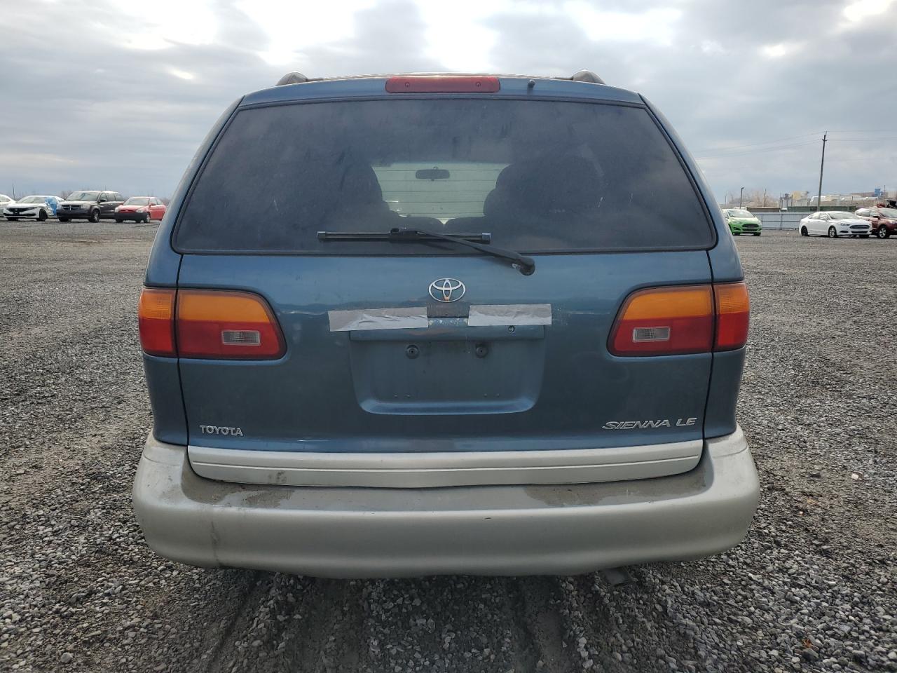 2000 Toyota Sienna Le VIN: 4T3ZF13C9YU280798 Lot: 80708614