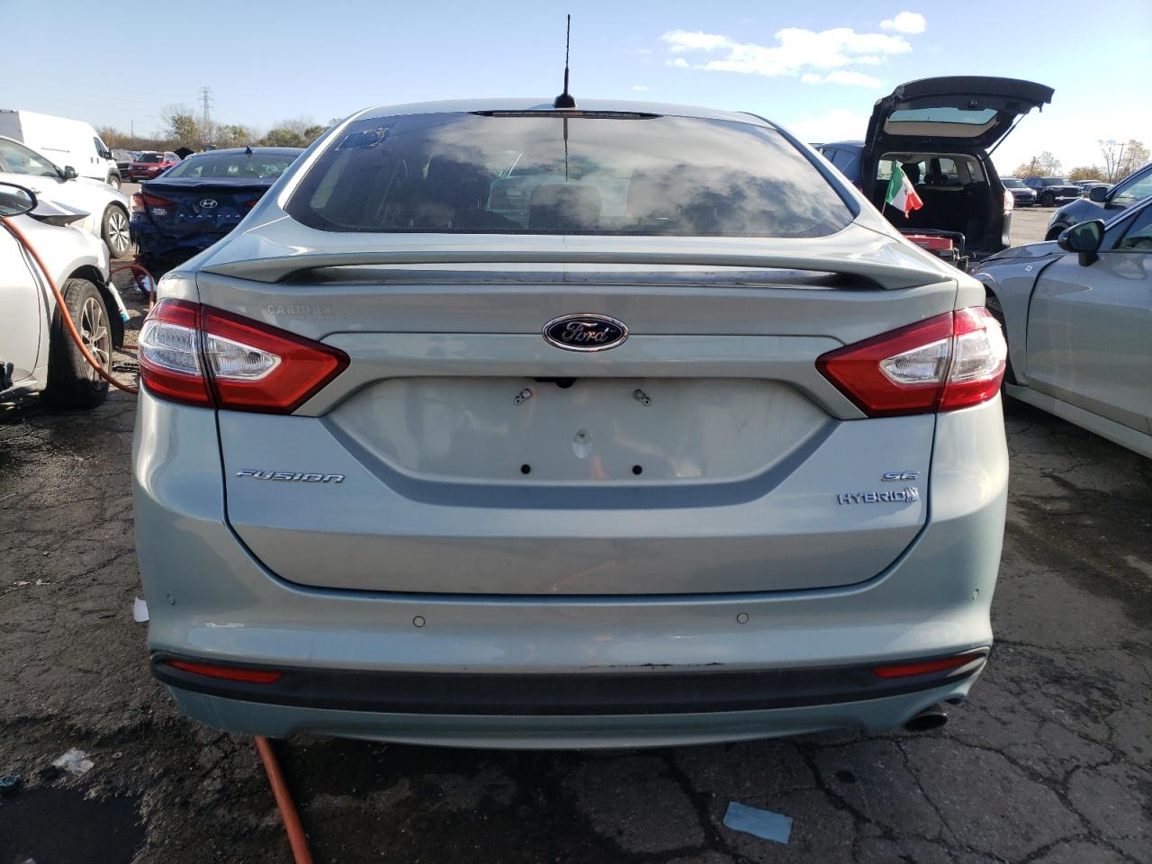 2014 Ford Fusion Se Hybrid VIN: 3FA6P0LU6ER313779 Lot: 79683934