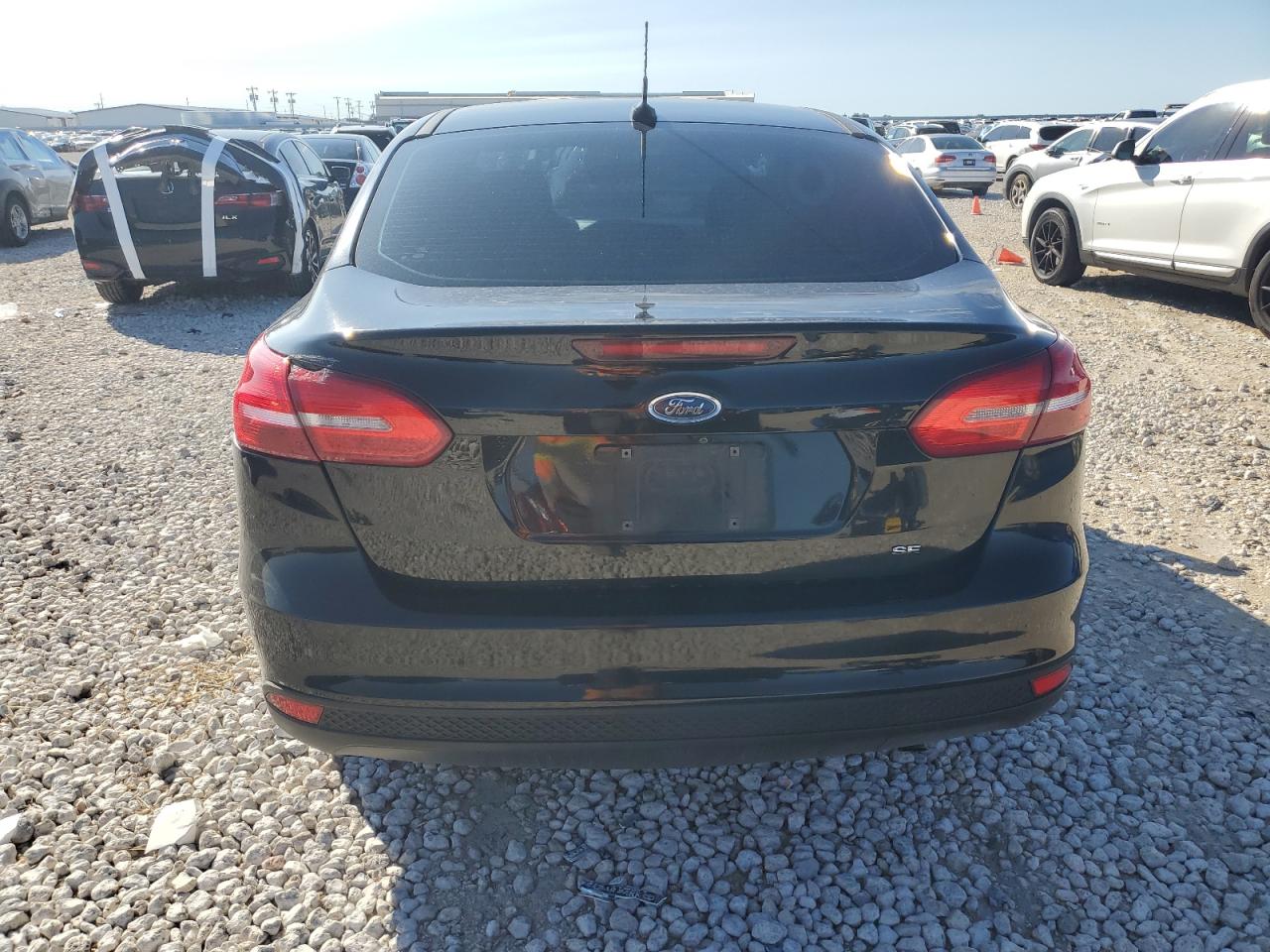 2018 Ford Focus Se VIN: 1FADP3F26JL240621 Lot: 79433944