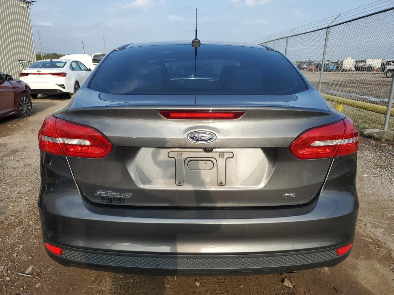 2018 Ford Focus Se VIN: 1FADP3F21JL266544 Lot: 79046024