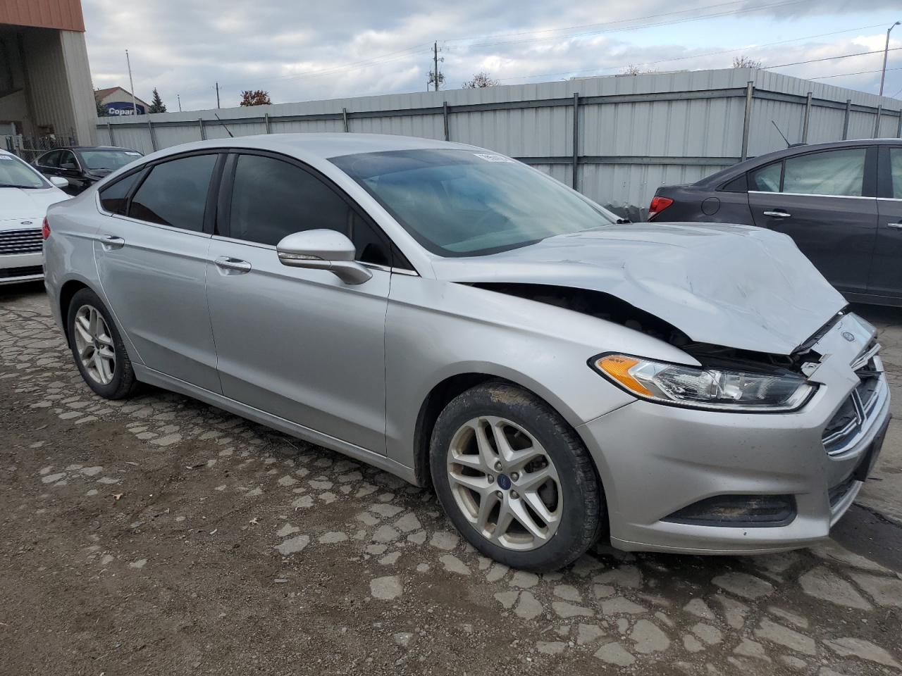 VIN 1FA6P0HD7F5101969 2015 FORD FUSION no.4