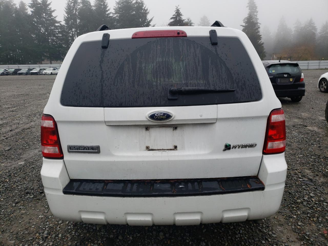 2009 Ford Escape Hybrid VIN: 1FMCU59339KA71332 Lot: 81052924