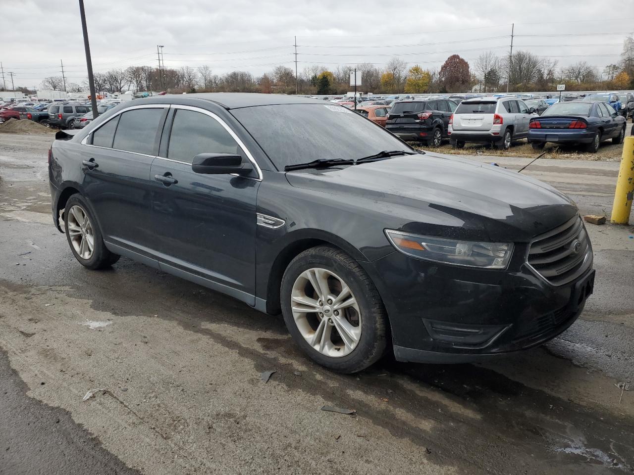 VIN 1FAHP2E94FG137935 2015 FORD TAURUS no.4