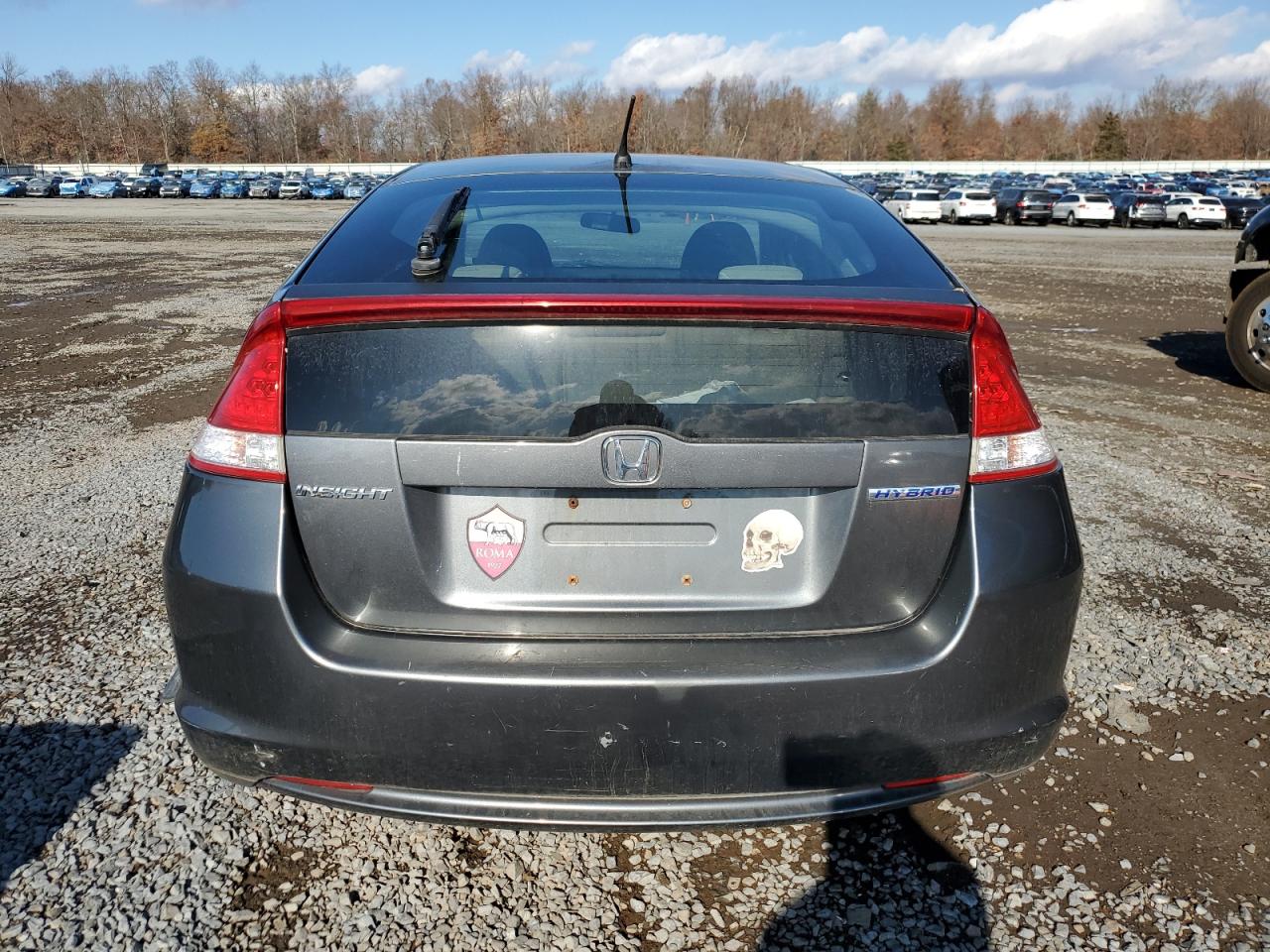 2011 Honda Insight Ex VIN: JHMZE2H74BS002698 Lot: 79909704