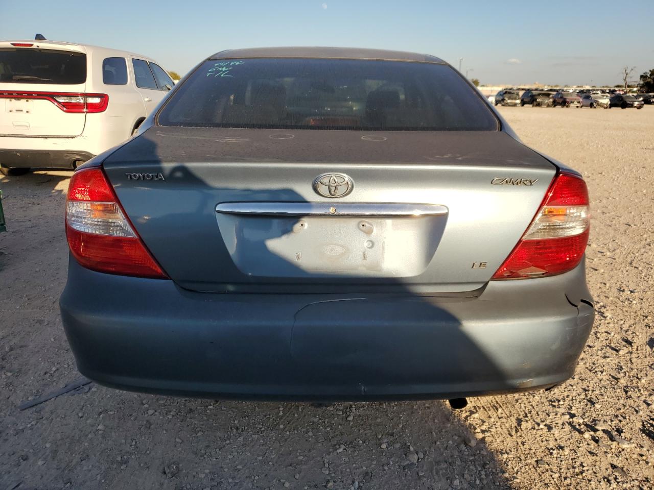 2004 Toyota Camry Le VIN: 4T1BE32KX4U915135 Lot: 80796004