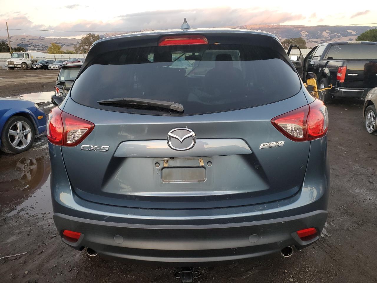 2016 Mazda Cx-5 Touring VIN: JM3KE2CY1G0799585 Lot: 80035404