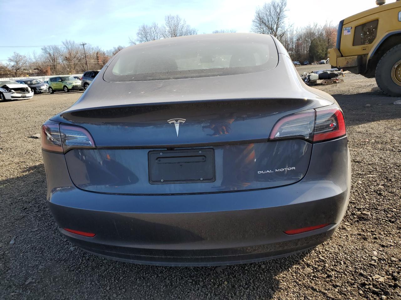 2023 Tesla Model 3 VIN: 5YJ3E1EB7PF621049 Lot: 80202204