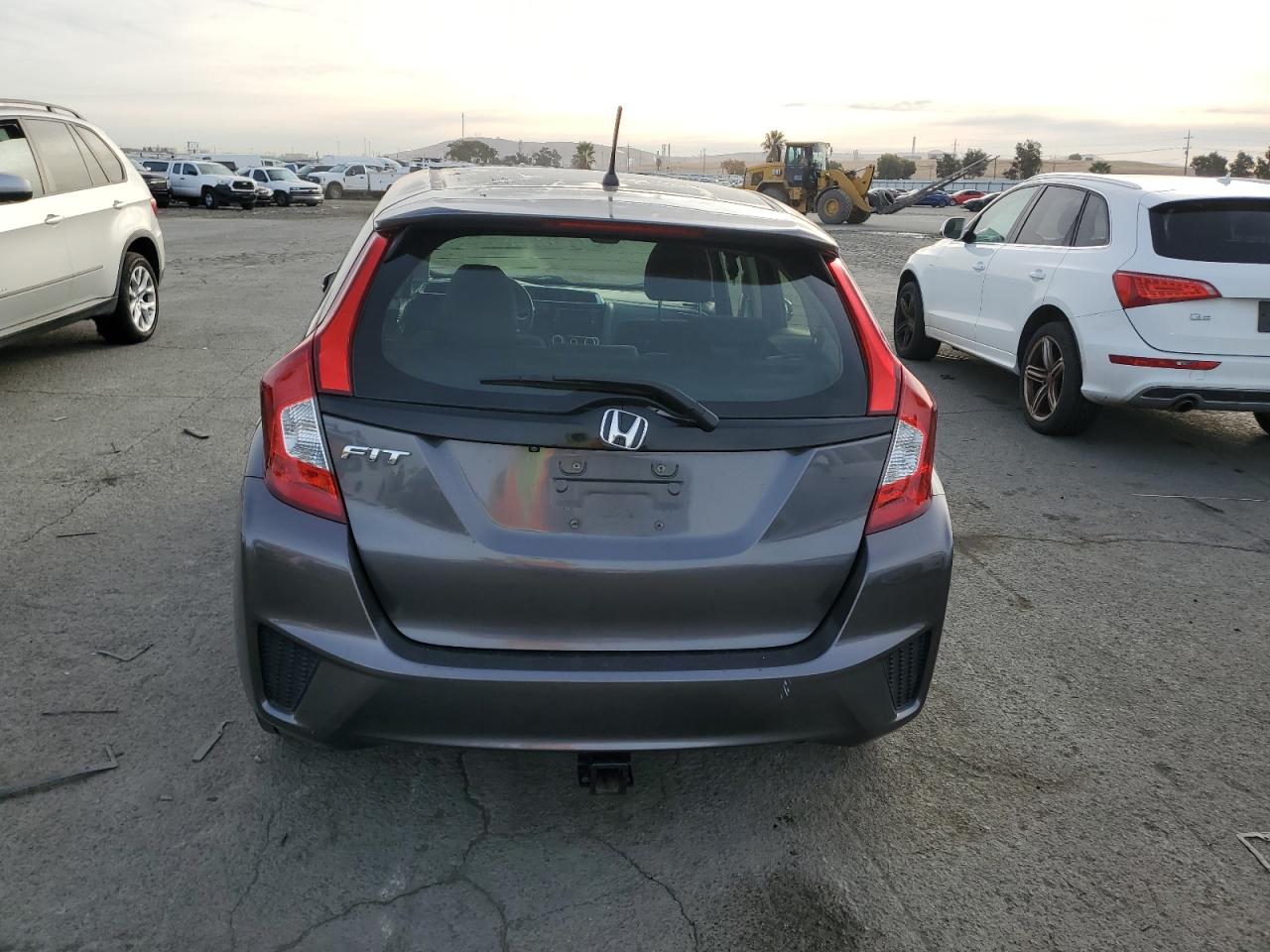 2016 Honda Fit Lx VIN: JHMGK5H54GX033718 Lot: 79353594