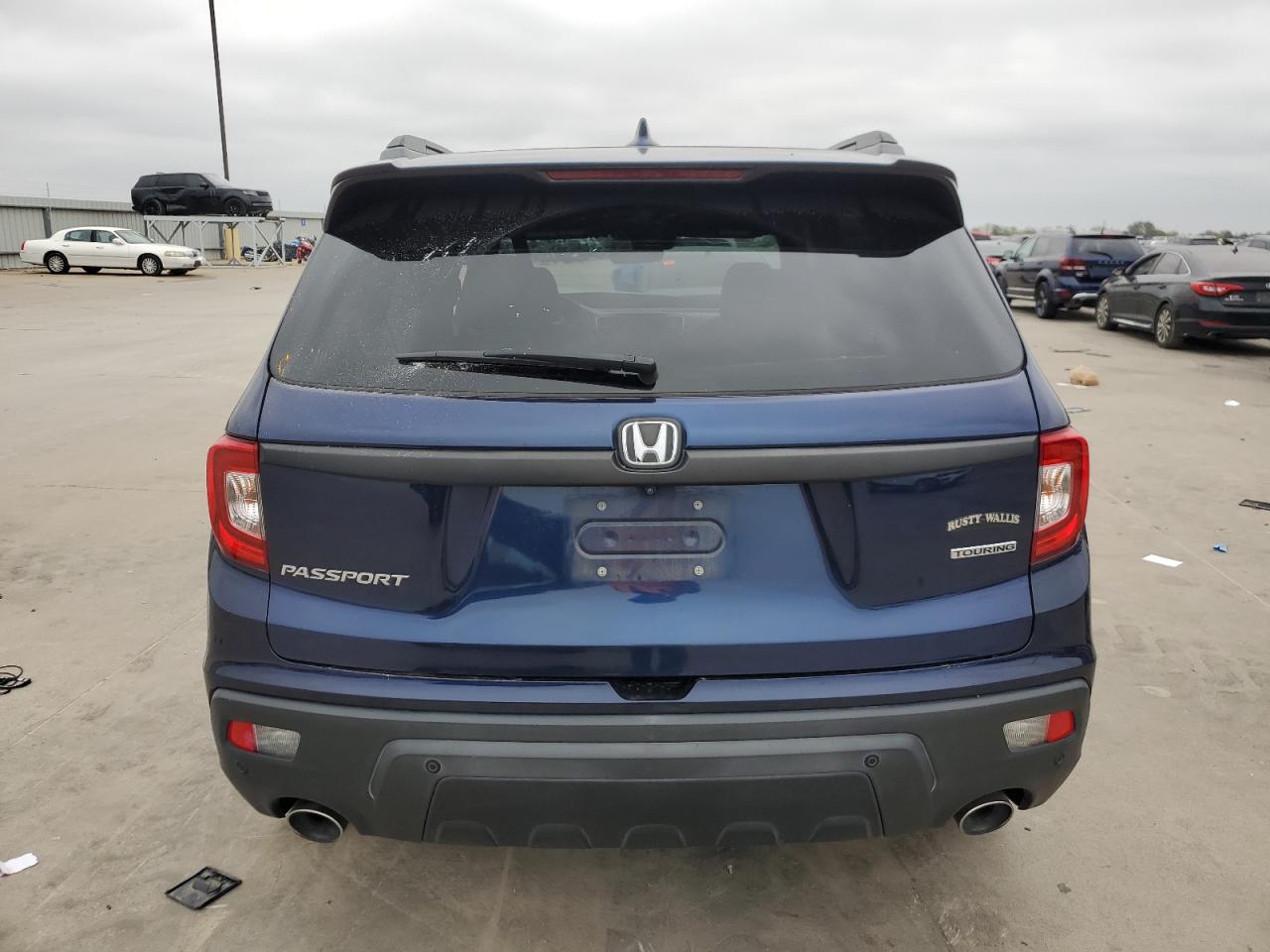 2019 Honda Passport Touring VIN: 5FNYF7H97KB000093 Lot: 78888424