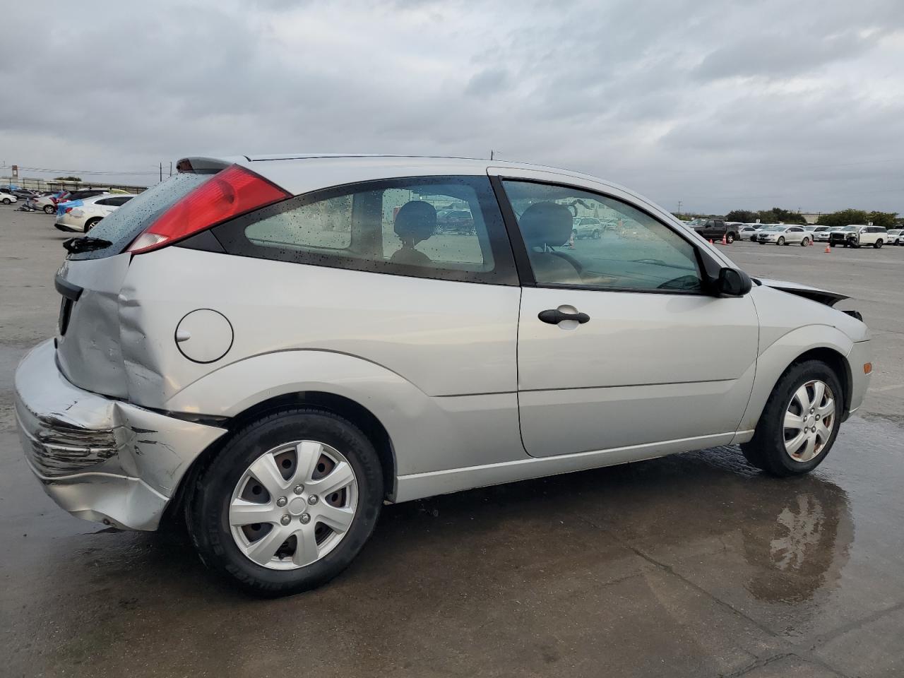 2007 Ford Focus Zx3 VIN: 1FAFP31N97W348989 Lot: 78757454