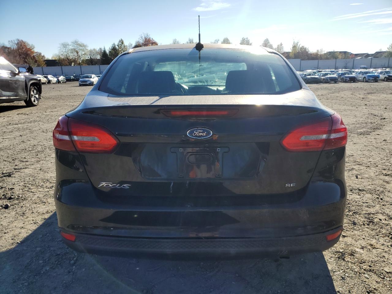 2018 Ford Focus Se VIN: 1FADP3FE3JL289320 Lot: 79992314