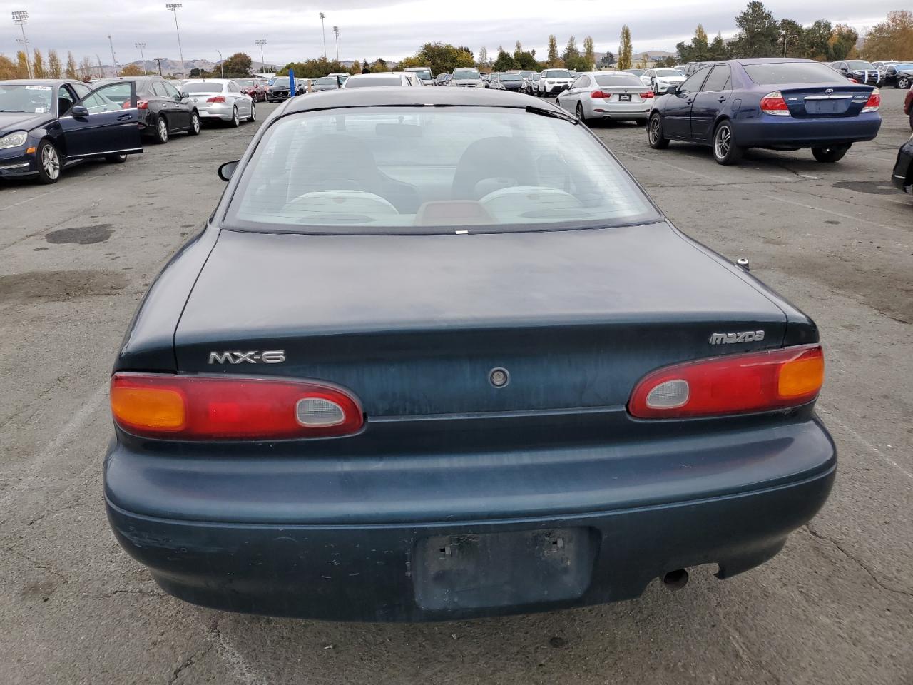 1993 Mazda Mx-6 VIN: 1YVGE31A2P5228999 Lot: 80751524