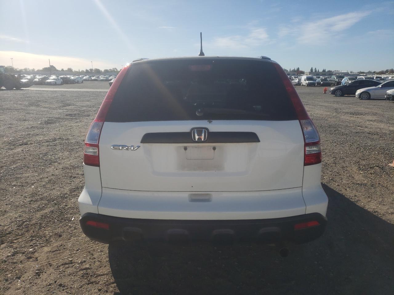 2007 Honda Cr-V Lx VIN: 5J6RE38397L002051 Lot: 79720314