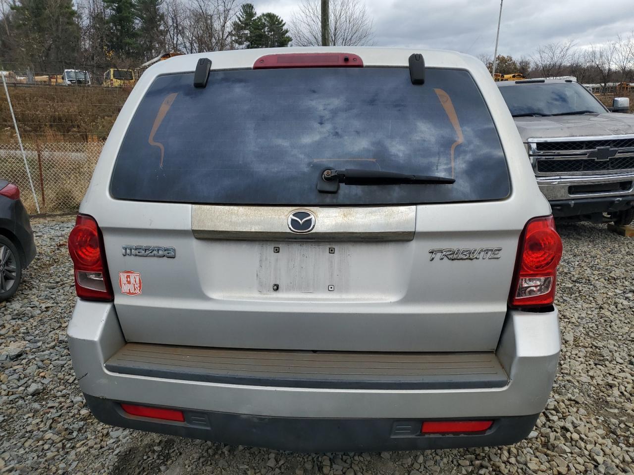 2009 Mazda Tribute I VIN: 4F2CZ02719KM03029 Lot: 79415284