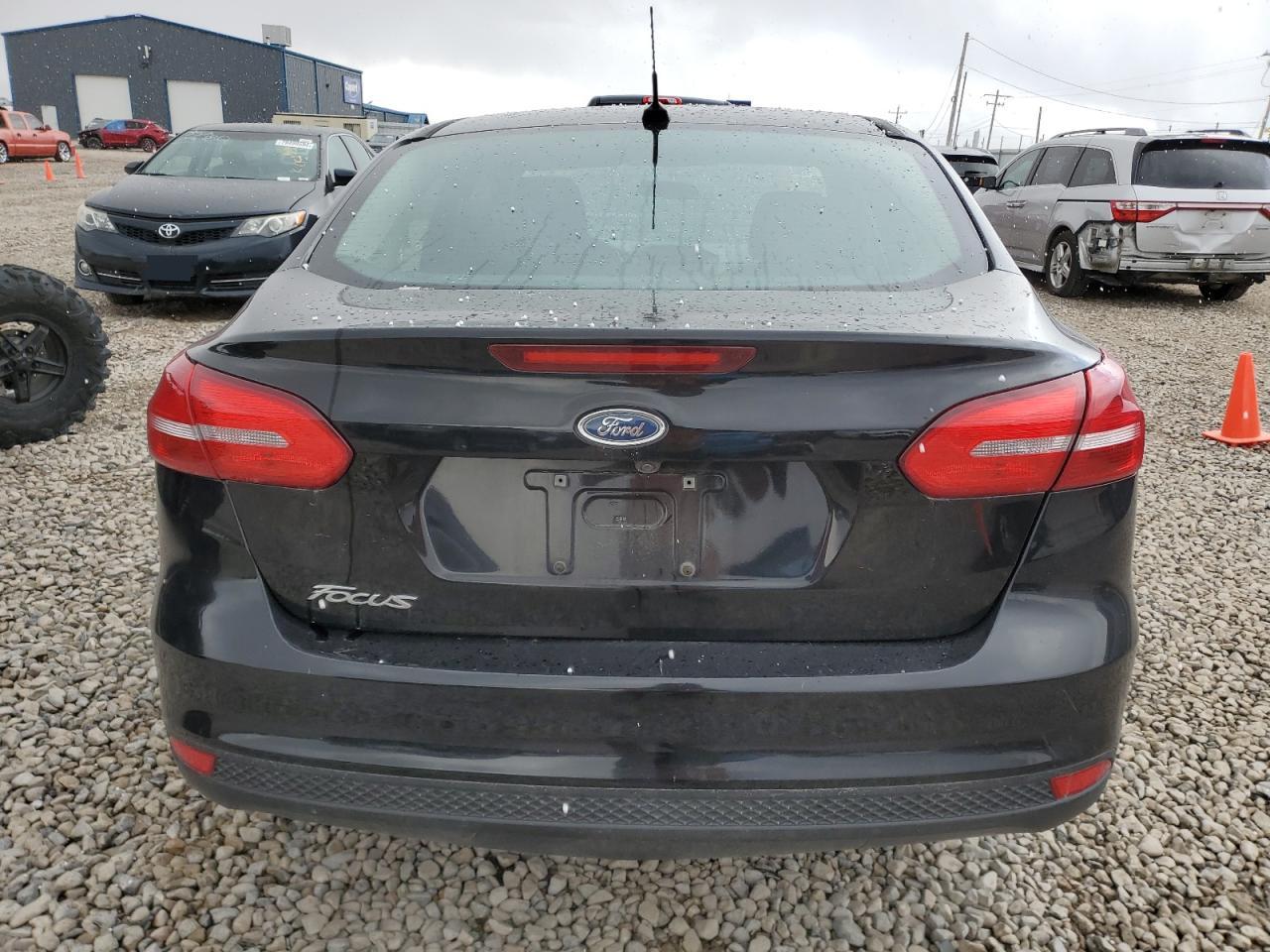 VIN 1FADP3E20HL258253 2017 FORD FOCUS no.6