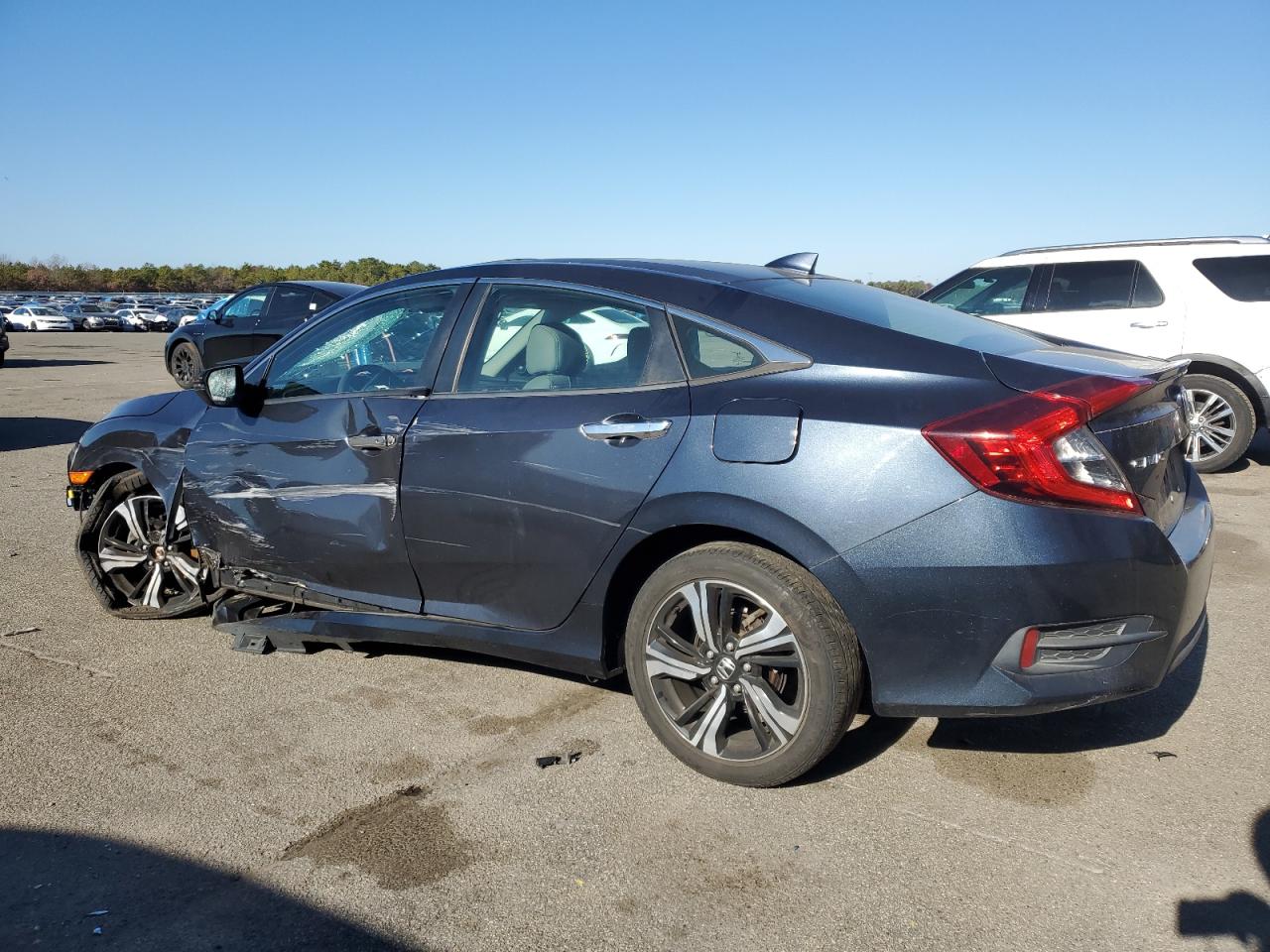 2017 Honda Civic Touring VIN: 2HGFC1F93HH656375 Lot: 79744504