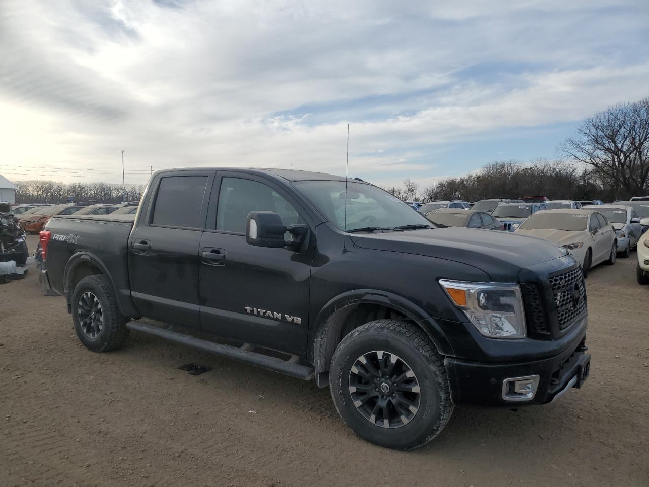 VIN 1N6AA1E58KN525399 2019 NISSAN TITAN no.4