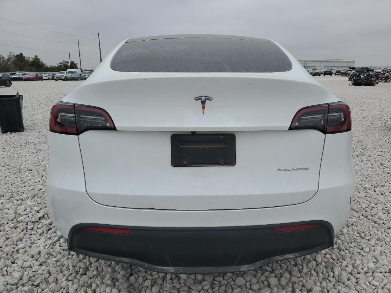 2023 Tesla Model Y VIN: 7SAYGDEE0PA070104 Lot: 77773654