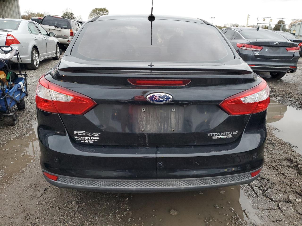 2014 Ford Focus Titanium VIN: 1FADP3J24EL448798 Lot: 79129734