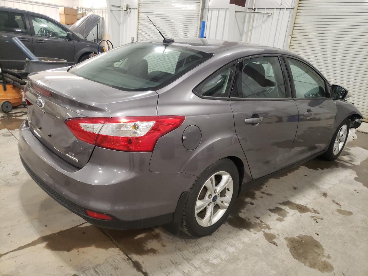 VIN 1FADP3F21EL131490 2014 FORD FOCUS no.3