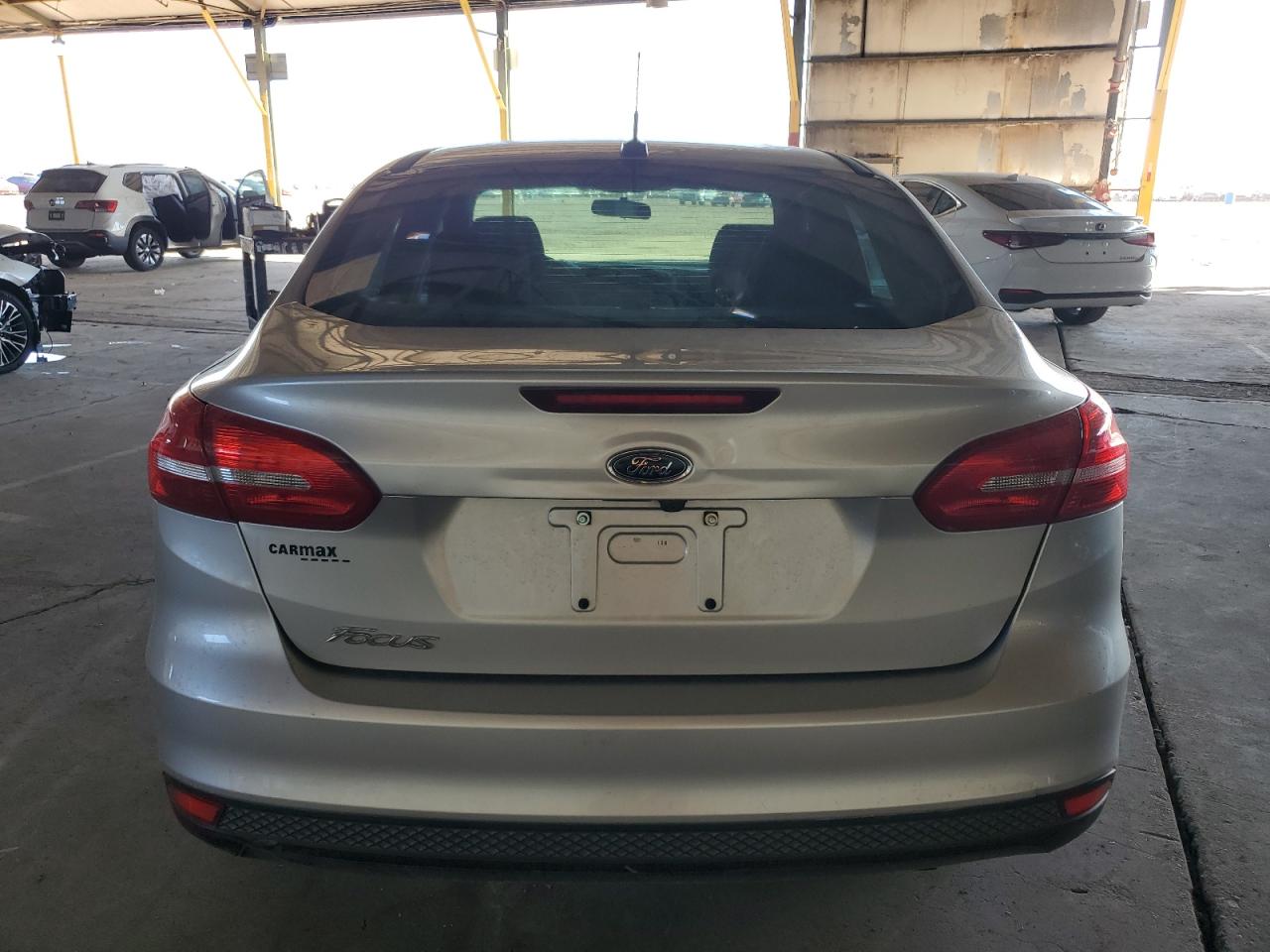 2018 Ford Focus S VIN: 1FADP3E27JL205510 Lot: 80596494