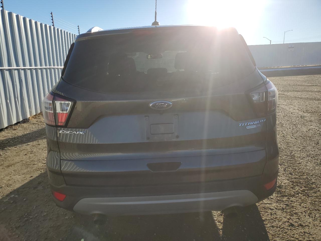 2017 Ford Escape Titanium VIN: 1FMCU9J92HUE60313 Lot: 79309614