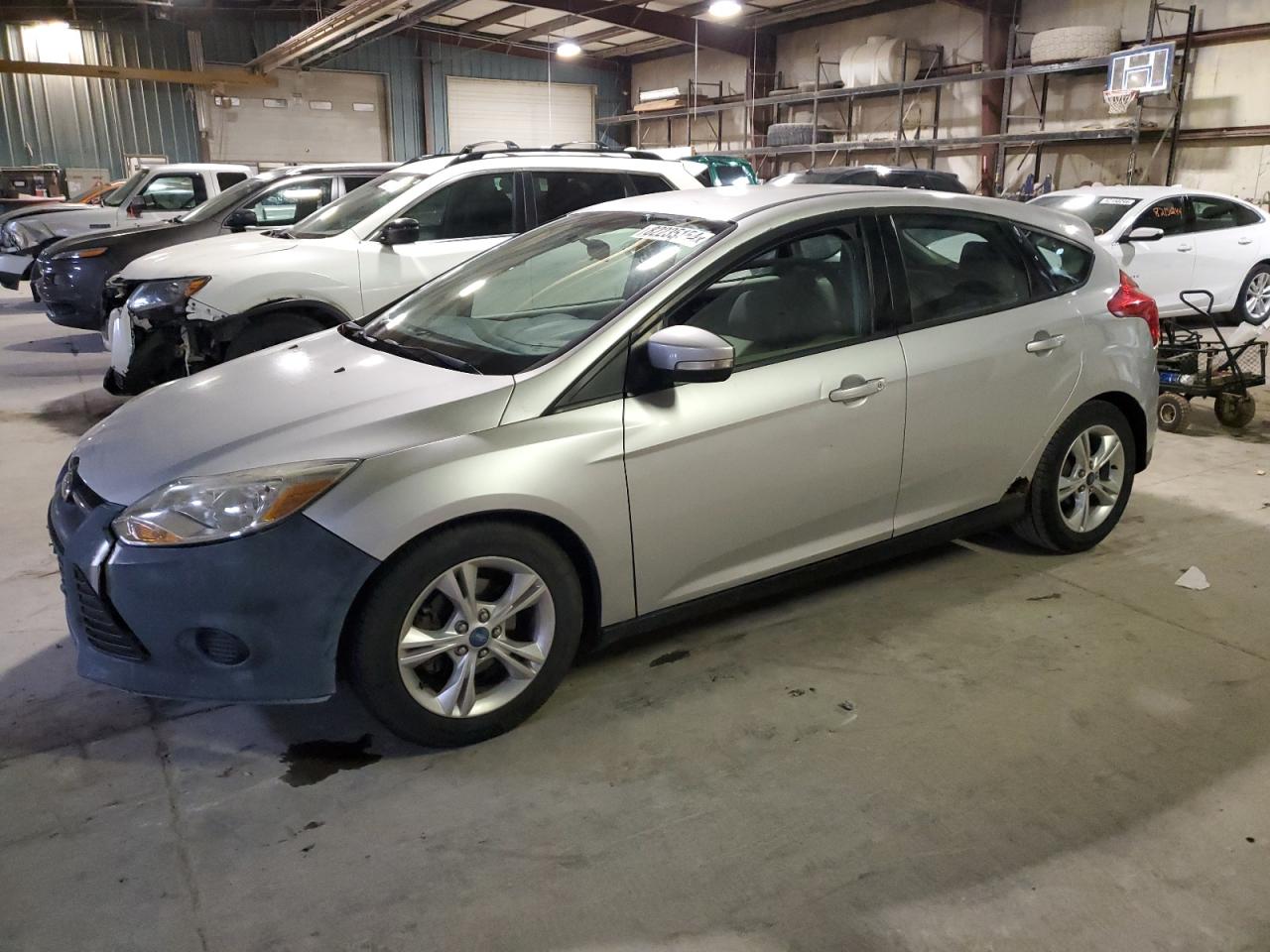 VIN 1FADP3K2XEL173808 2014 FORD FOCUS no.1