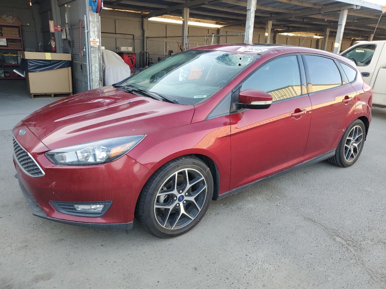 VIN 1FADP3M21HL303508 2017 FORD FOCUS no.1