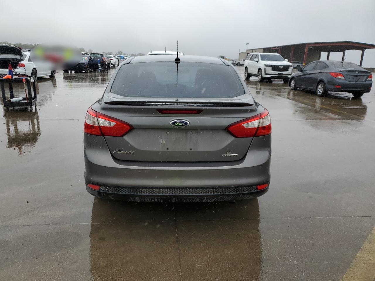 2013 Ford Focus Se VIN: 1FADP3F23DL132719 Lot: 79770944