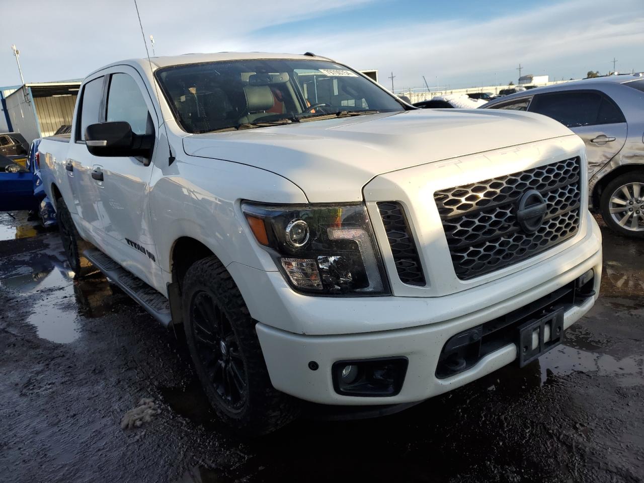 VIN 1N6AA1E59JN549175 2018 NISSAN TITAN no.4