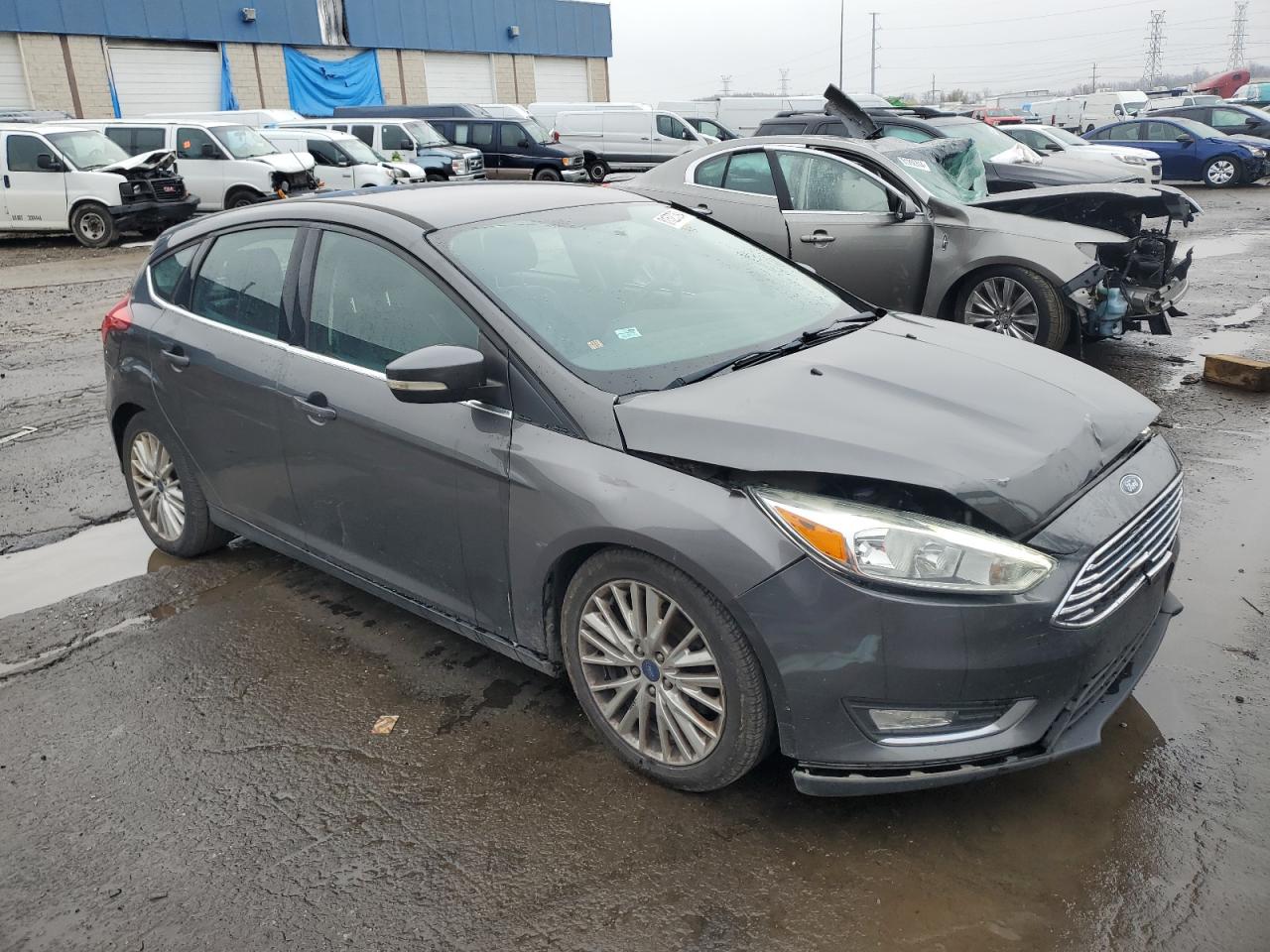 VIN 1FADP3N20FL230143 2015 FORD FOCUS no.4